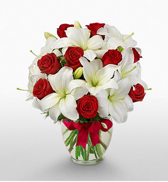  Sivas çiçek satışı  1 dal kazablanka 11 adet kırmızı gül vazosu